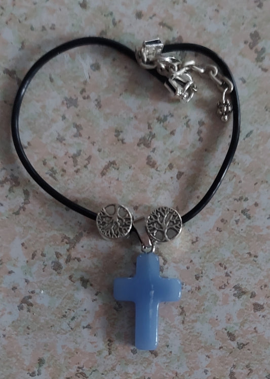 Blue cross and silver tree of life bracelet