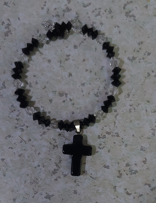 Black and crystal bracelet with a cross pendant